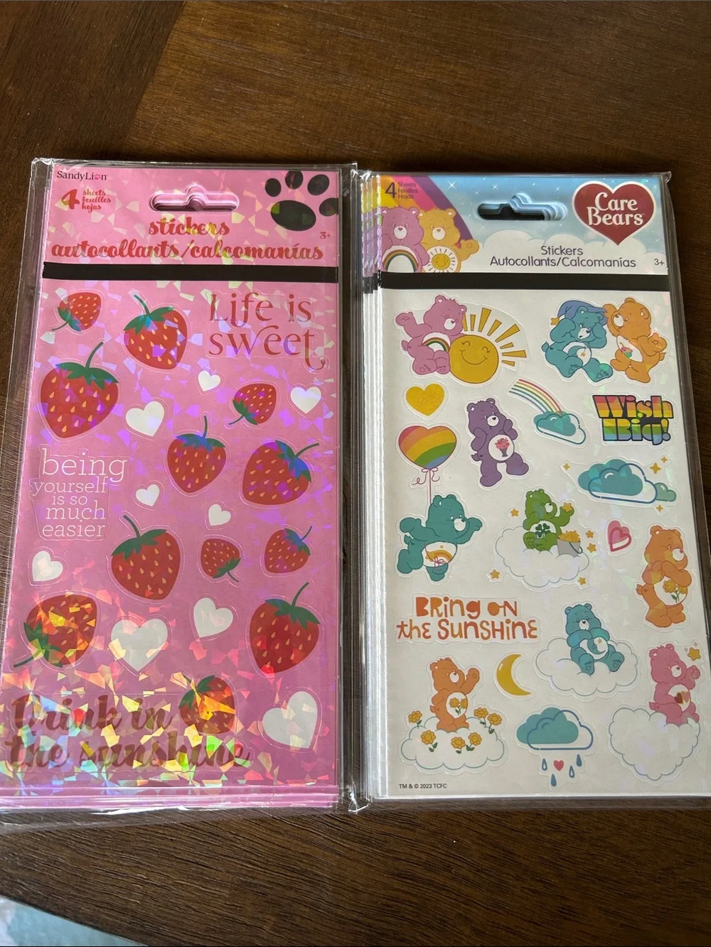 Carebear and strawberry stickers lot. 2- 6 pack packages of 4 sheets each